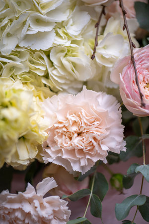 A Stunning Arrangement Featuring a Beautiful Bouquet of Pink and White Rosesの写真素材