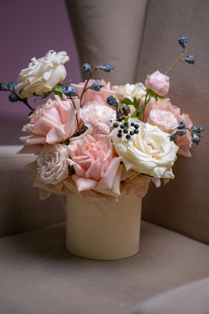 A Stunning Arrangement Featuring a Beautiful Bouquet of Pink and White Roses Alongside Liliesの写真素材
