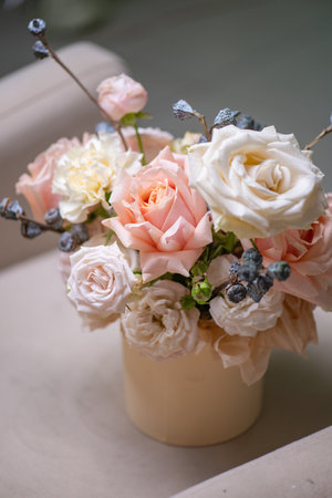 A Stunning Arrangement Featuring a Beautiful Bouquet of Pink and White Roses Alongside Liliesの写真素材
