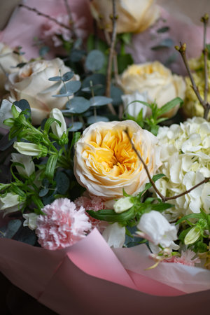 Delicate composition of white and pink rosesの写真素材