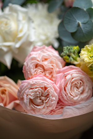 Delicate white and pink roses close upの写真素材