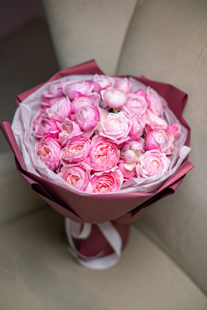 Beautiful pink bouquet of flowers. Vibrant Floral Arrangement Featuring a Variety of Colorful Bloomsの写真素材