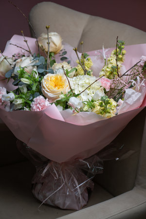Delicate composition of white and pink rosesの写真素材