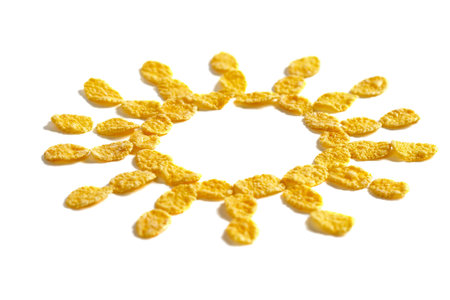 Corn flakes sun symbol isolated over white background