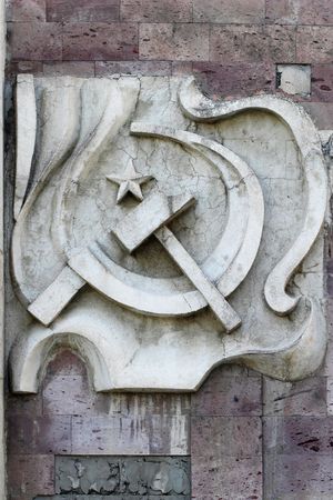 Sickle and hammer old dusty tile building decorationの写真素材