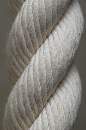 Tightrope fragment texture macro shot over grey backgroundの写真素材