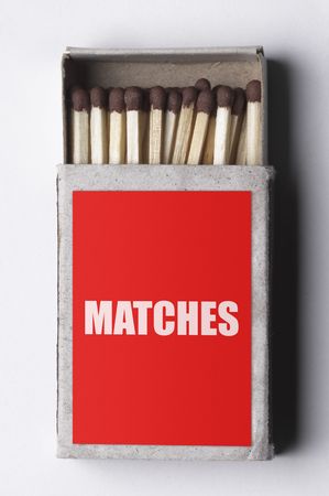 Opened red label matchbox isolated over white backgroundの写真素材