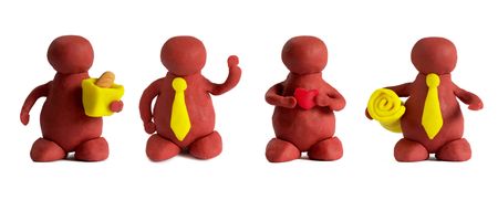 Four plasticine mans isolated over white backgroundの写真素材