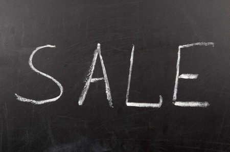 Chalk drawn word sale over blackboard macro shotの写真素材