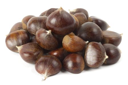 Heap of chestnuts isolated over white backgroundの写真素材
