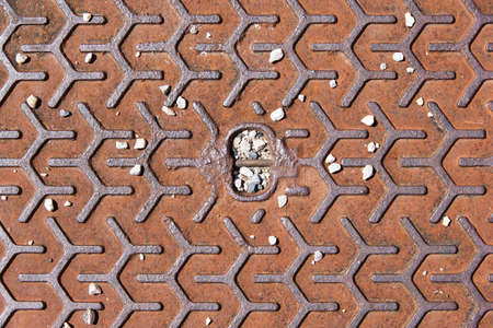 rusty old metallic textured surface with small pebblesの写真素材