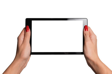 female hands holding a black tablet isolated on white background