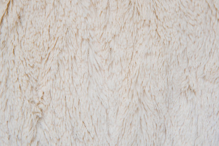 white artificial furry fabric close up detail