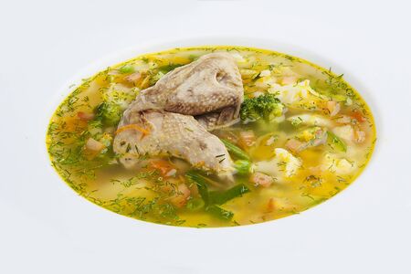Vegetable soup with chicken. On a white backgroundの写真素材