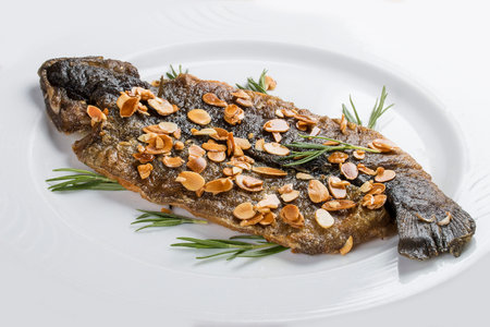 Seabass grill on a white plate