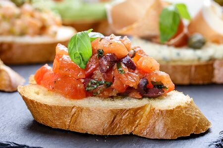 Bruschetta with tomato and Basilの写真素材