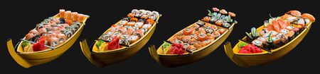 Sushi set in a wooden boat on a black background の写真素材