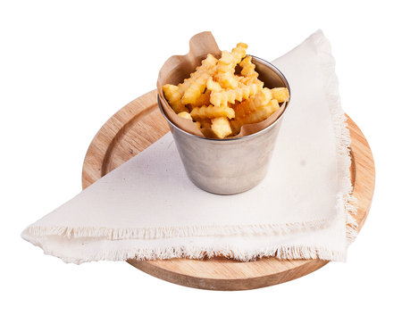 Fried potatoes in a bucket. On white background