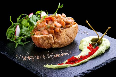 Salmon Tartar with avocado sauceの写真素材