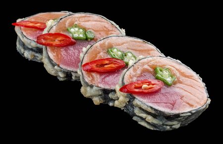 Sushi roll with salmon and tuna on black backgroundの写真素材