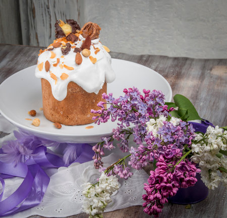 Easter yeast cake with icing and candied orange peel, delicious Easter dessert, traditional Easter...