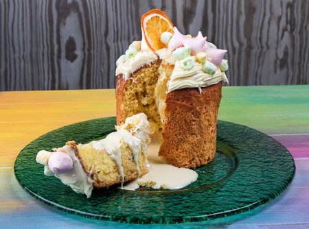 Easter yeast cake with icing and candied orange peel, delicious Easter dessert, traditional Easter...