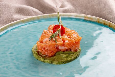 Salmon Tartar on avocado mousseの写真素材