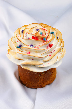 Easter yeast cake with icing and candied orange peel, delicious Easter dessert, traditional Easter...