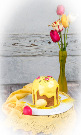 Easter yeast cake with icing and candied orange peel, delicious Easter dessert, traditional Easter...