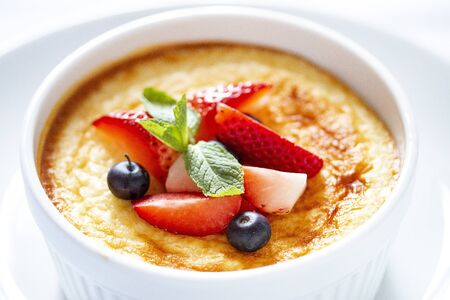 Baked cottage cheese dessert with strawberry on white backgroundの写真素材