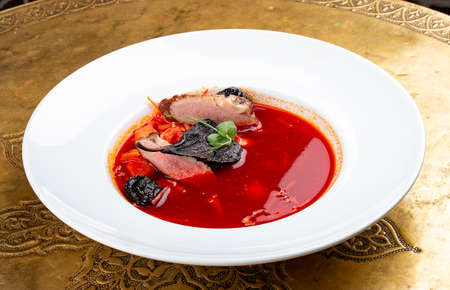 Smoked borscht with duck. Classic retro Russian dishの写真素材
