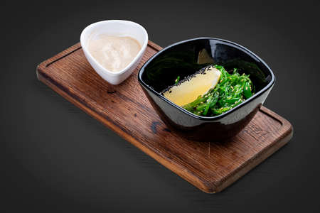 Chuka salad with walnut sauce. Vegetable dishの写真素材