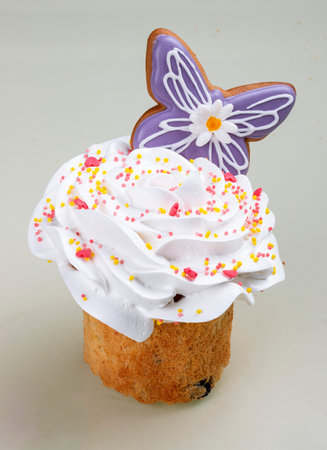 Easter cake with decorative elements, figurines and toppings.