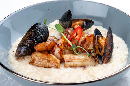 Risotto with seafood: shrimp and mussels. Isolated imageの写真素材