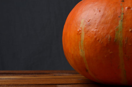 Juicy pumpkin on a gray background