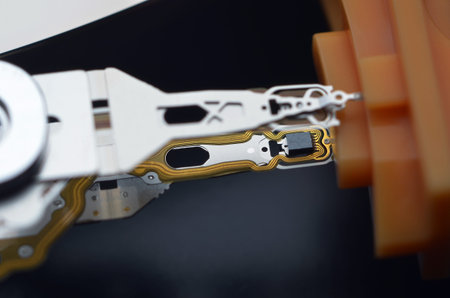 Close-up of hard disk drive on black background, shallow depth of field