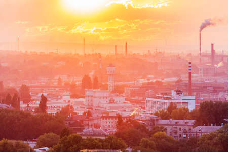 Beautiful industrial sunset in cityの写真素材