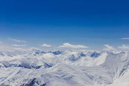 Panoramic view at snowy mountainsの写真素材