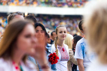 KYIV, UKRAINE - JUNE 21: Beautiful girl on concert of Okean Elzy on JUNE 21 2014 in NSC Olimpiyskiy. Final concert of world tour named "20 years togetherÂ» on JUNE 21 2014 in Kyiv, Ukraineのeditorial素材
