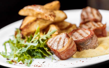 Pork Medallions with Mushed Potatoの写真素材