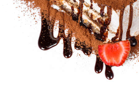 tiramisu on a plate decorated with chocolateの写真素材