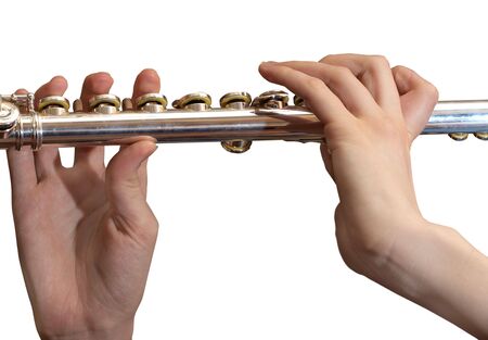   The image on the theme of musical instruments. Flute in the women's hands      の写真素材