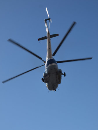     color photograph mi8 Russian helicopter in flight    