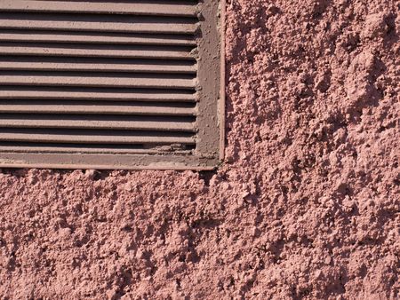     color photo of stone painted wall with an iron box     の写真素材