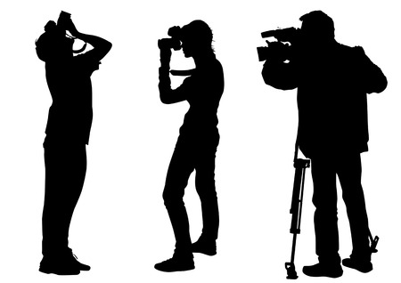 Vector graphic cameraman at work. Isolated silhouette on a yellow backgroundのイラスト素材