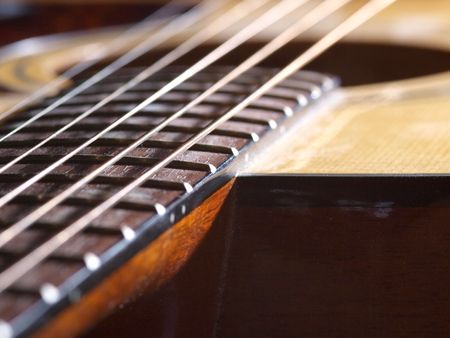 Color photo of an strings acoustic guitarの写真素材