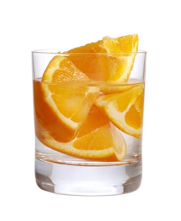 Color photograph of glass tumblers and oranges       の写真素材