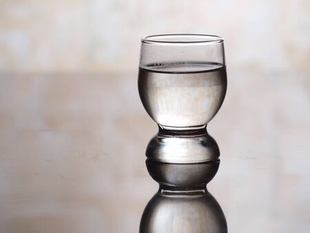 Color photo of a glass cup with tequila       の写真素材