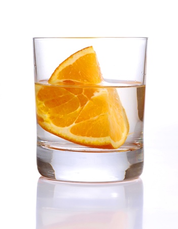 Color photograph of glass tumblers and oranges       の写真素材