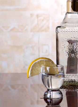 Color photo of a glass cup with tequila        の写真素材